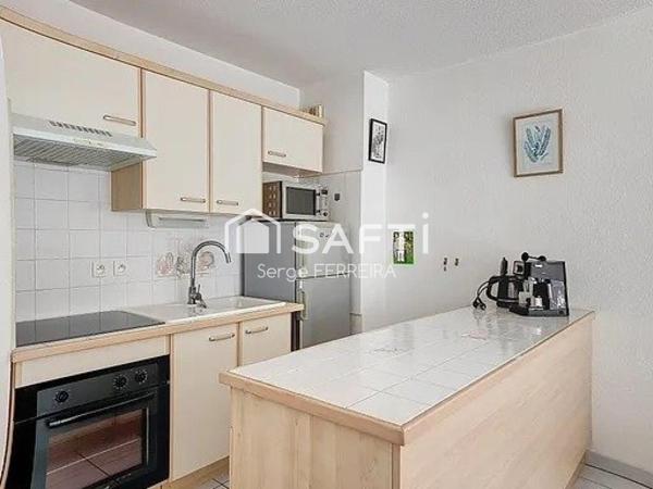 Appartement traversant avec terrasse et parking
