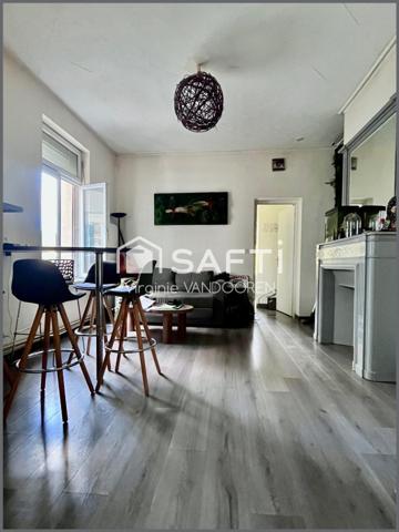 Appartement face aux remparts avec toit terrasse