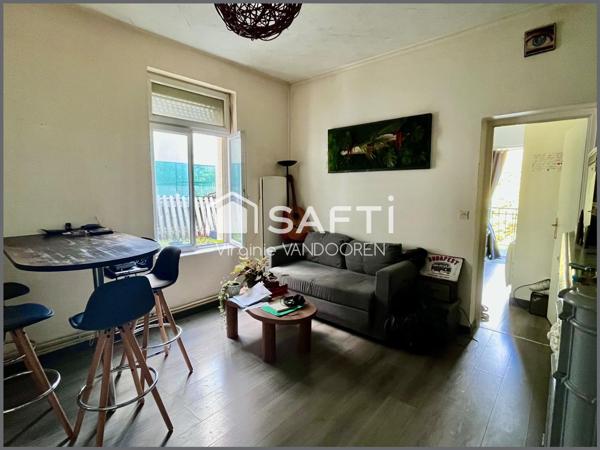 Appartement face aux remparts avec toit terrasse