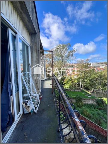 Appartement face aux remparts avec toit terrasse