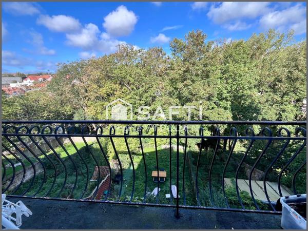 Appartement face aux remparts avec toit terrasse
