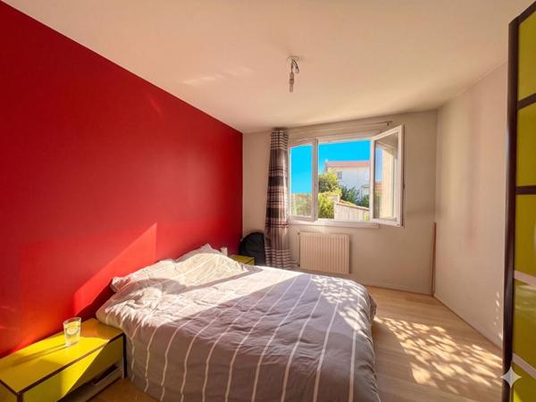 Appartement T2 avec balcon, parking et caves
