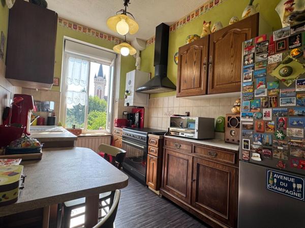 Appartement T5 dans immeuble de caractère