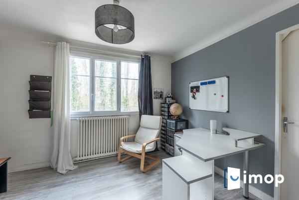 Maison 4 chambres avec grand jardin, garage triple  à 5 min des transports