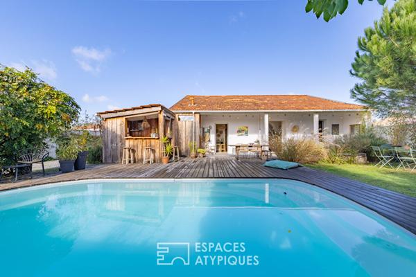 Ancienne longère revisitée avec piscine et jardin arboré