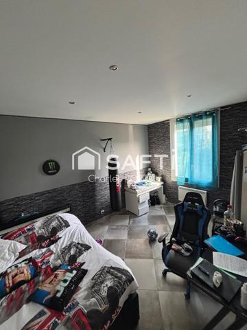 Superbe maison, mitoyenne et son environnement, calme