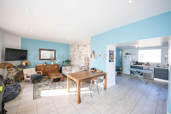Maison 7 pièce(s) 4 chambre(s) 210 m²
