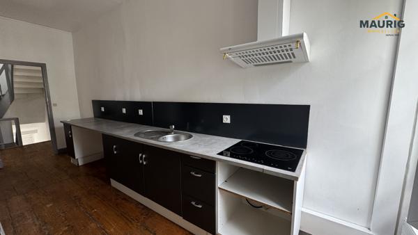 Maison de ville avec 2 chambres, un bureau ou dressing et jardin