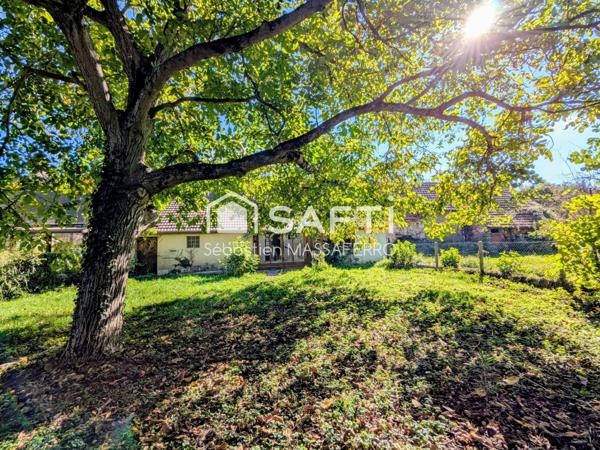 Maison de plain-pied avec jardin et véranda