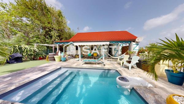 Maison sur deux niveaux, F4 et deux F2, piscine