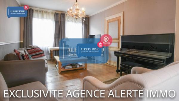 Maison semi-individuelle de 180 m2 en double distributionavec beaucoup de charme et de cachet comprenant 2 séjours, 5 ch + 1 bureau, 1 cave et un beau jardin