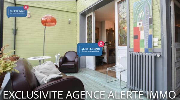Maison semi-individuelle de 180 m2 en double distributionavec beaucoup de charme et de cachet comprenant 2 séjours, 5 ch + 1 bureau, 1 cave et un beau jardin