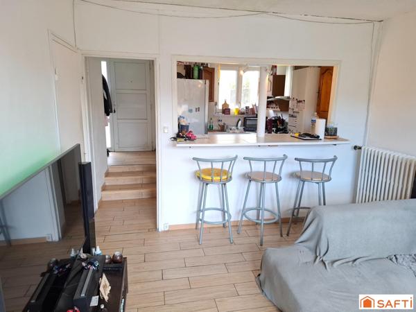 Maison mitoyenne vendu louée de 85m2 avec jardin, 5 pièces dont 3 chambres