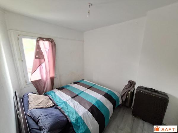 Maison mitoyenne vendu louée de 85m2 avec jardin, 5 pièces dont 3 chambres