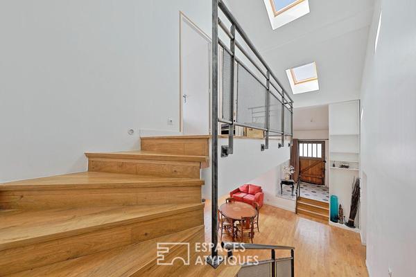 Esprit factory et volumes spectaculaires pour ce loft avec jardin privatif