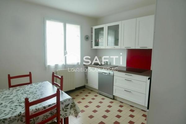 Maison 81 m² avec garage et jardin, proche centre.