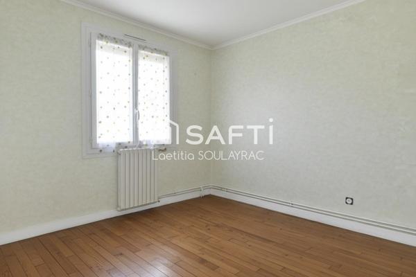 Maison 81 m² avec garage et jardin, proche centre.
