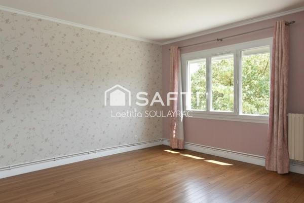 Maison 81 m² avec garage et jardin, proche centre.