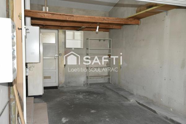 Maison 81 m² avec garage et jardin, proche centre.