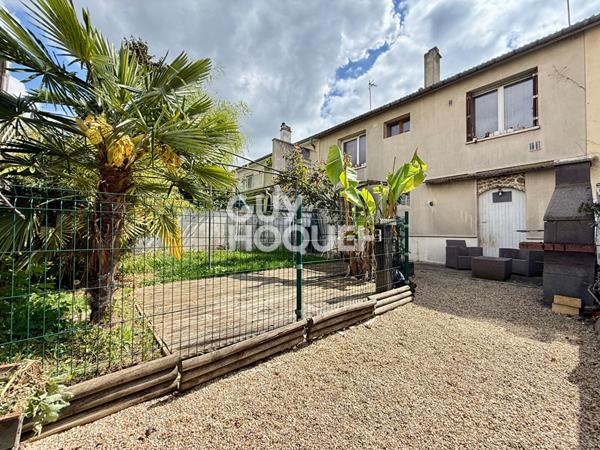 À vendre Maison Reims avec garage et jardin.