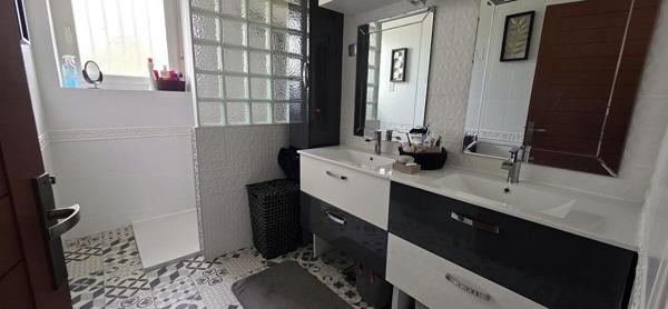 Maison familiale de 116 m²  habitable, offrant 4 chambres et un grand jardin