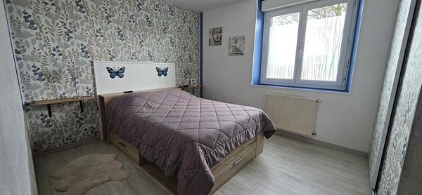 Maison familiale de 116 m²  habitable, offrant 4 chambres et un grand jardin