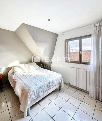 Maison de charme lumineuse sur trois niveaux, au calme à Drancy, avec terrasse, suite, garage et beaux volumes