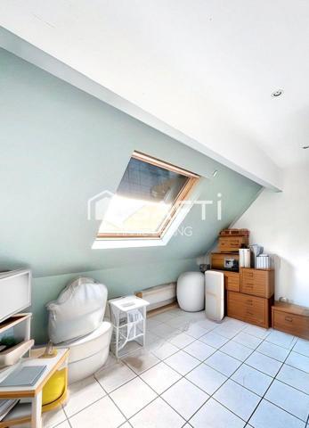 Maison de charme lumineuse sur trois niveaux, au calme à Drancy, avec terrasse, suite, garage et beaux volumes