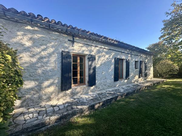 Maison en pierre de 3 chambres avec grange et atelier