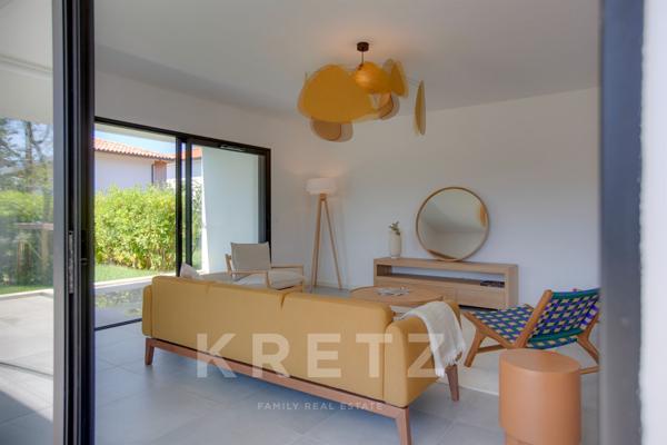 A deux pas des cinq cantons, élegant appartement en rez-de-jardin avec garage, cave et ascenseur