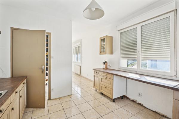 Appartement Type 4 de 91m² avec balcon + combles aménagé et jardin à Saint-Priest