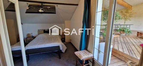 maison atypique offrant un havre de paix avec vue dégagée