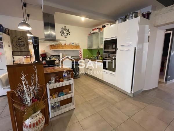 Maison de ville composée de deux logements