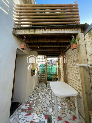 Maison de ville composée de deux logements