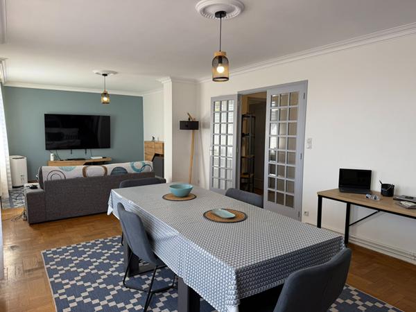 Appartement traversant de 103 m² avec terrasse garage parquets proche centre-ville et canal