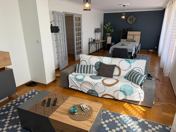 Appartement traversant de 103 m² avec terrasse garage parquets proche centre-ville et canal