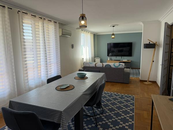 Appartement traversant de 103 m² avec terrasse garage parquets proche centre-ville et canal