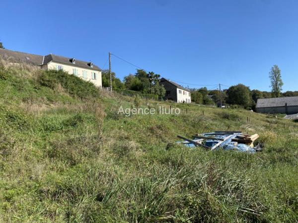 Terrain constructible - Proximite oloron-sainte-marie - Réf.:205088 PROXIMITE OLORON - TERRAIN DE 1150 M² AVEC VUE PYRENEES. BAISSE DE PRIX.