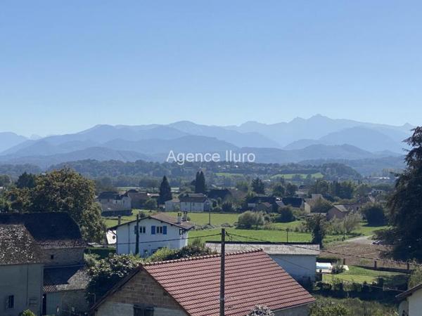 Terrain constructible - Proximite oloron-sainte-marie - Réf.:205088 PROXIMITE OLORON - TERRAIN DE 1150 M² AVEC VUE PYRENEES. BAISSE DE PRIX.
