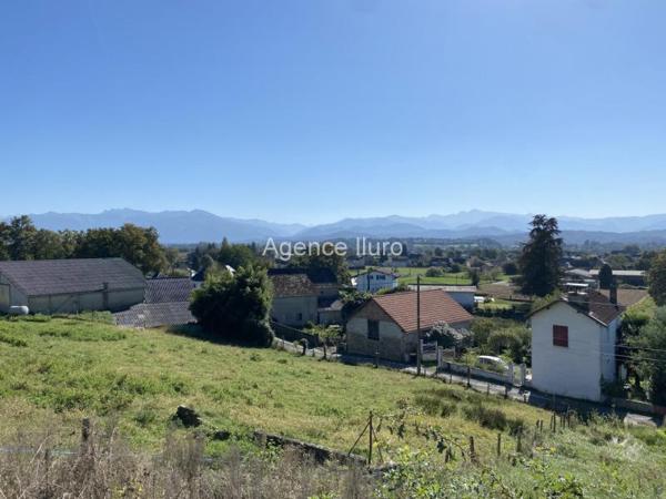 Terrain constructible - Proximite oloron-sainte-marie - Réf.:205088 PROXIMITE OLORON - TERRAIN DE 1150 M² AVEC VUE PYRENEES. BAISSE DE PRIX.