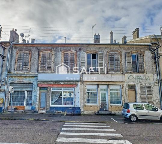 IMMEUBLE EN PLEIN CENTRE