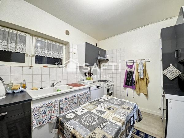 IMMEUBLE EN PLEIN CENTRE