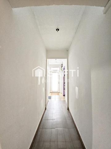 IMMEUBLE EN PLEIN CENTRE