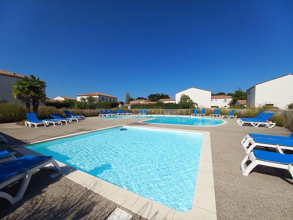 Charmante villa 4 pièces avec garage, terrasse et jardin au coeur d'une résidence avec piscine