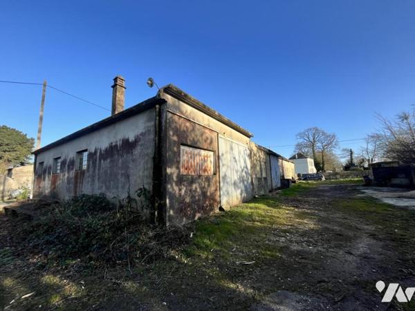 A VENDRE REMUNGOL Terrain avec bâtiment
