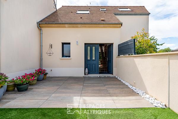 Maison contemporaine atypique de 180 m² sur trois niveaux avec rez-de-jardin