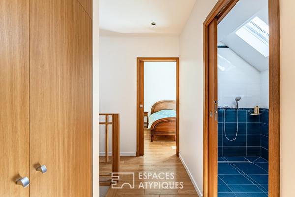 Maison contemporaine atypique de 180 m² sur trois niveaux avec rez-de-jardin