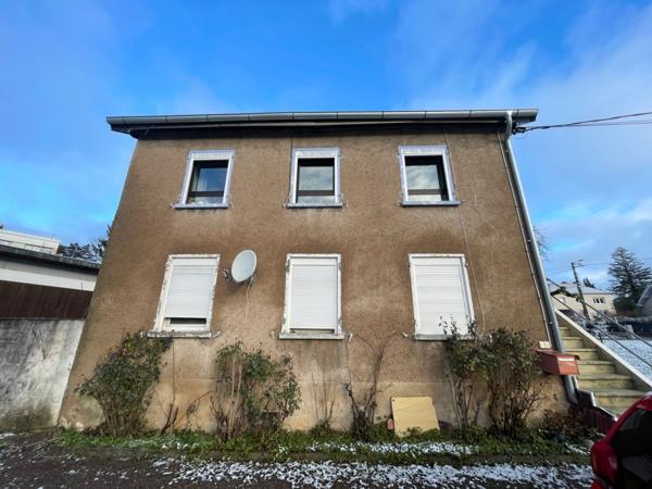 Appartement F2 bis avec cave, terrain et parking