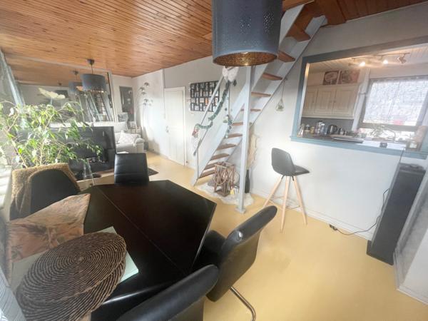 Appartement F2 bis avec cave, terrain et parking