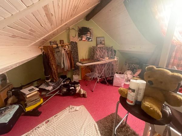 Appartement F2 bis avec cave, terrain et parking